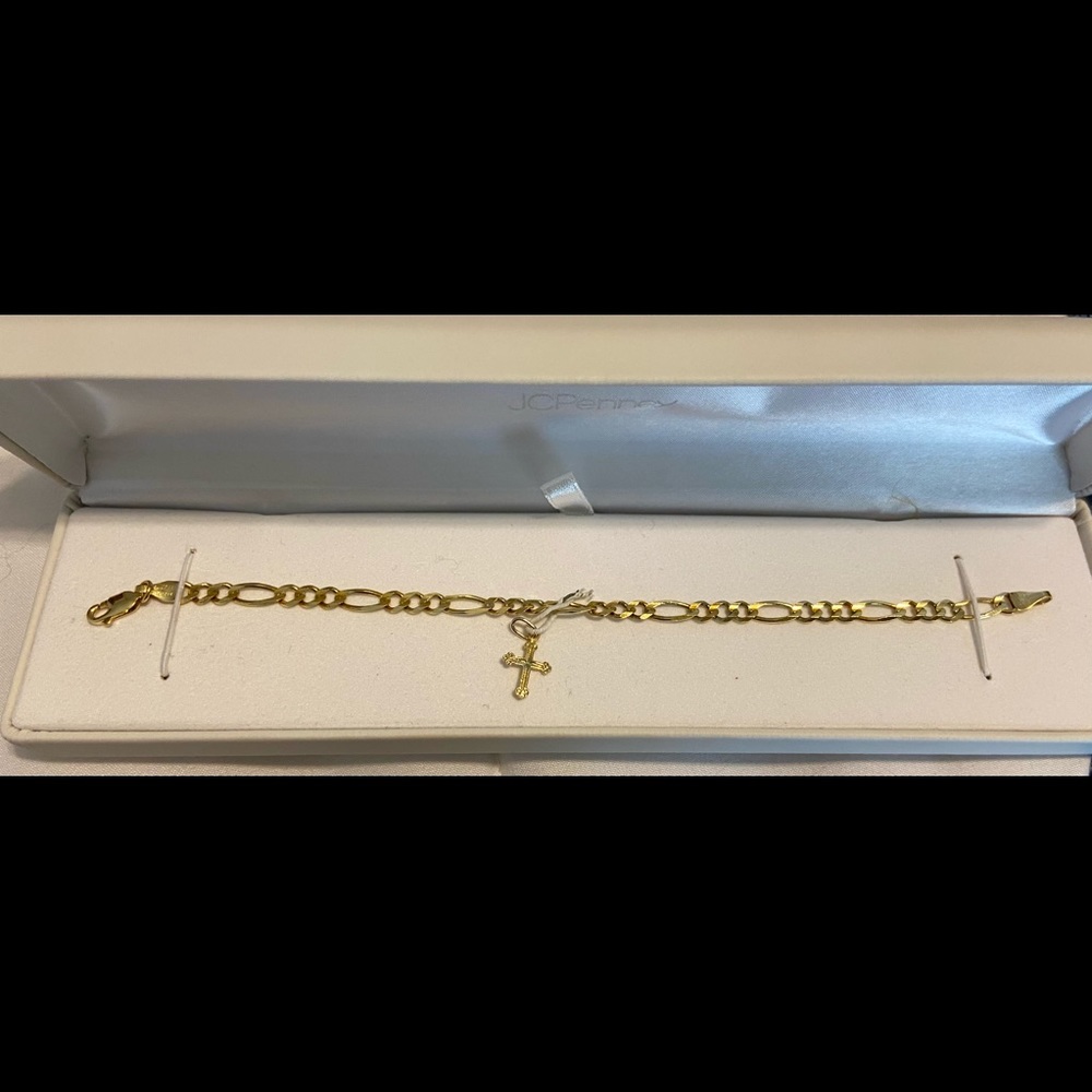 14 karat gold bracelet with attachable gold cross pendant